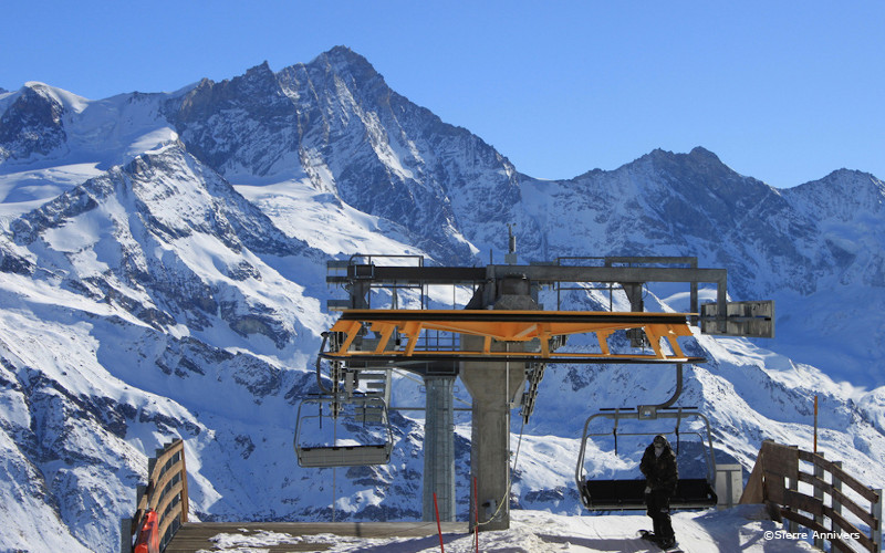 grimentz ski holidays, snowboarder coming off lift