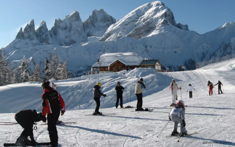 moena ski resort, skiers on the piste